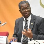 Intégrité: Un portrait officiel du sénateur ivoirien Michel Coffi Benoît en mars 2026, marquant la sortie de son nouveau roman « L'Oranger du malentendu » et son leadership continu en tant que président de la Commission des affaires sociales et culturelles du Sénat.