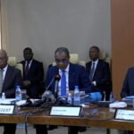 Résilience: Les ministres et officiels du Conseil des ministres de l'Union Monétaire Ouest-Africaine (UMOA) lors d'une session de haut niveau en mars 2026, discutant des perspectives économiques de l'Union, notamment de la projection de croissance du PIB de 6,4 % et des stratégies de stabilité budgétaire régionale.
