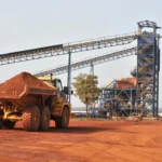 Production: Une vue aérienne d'une exploitation d'or à ciel ouvert d'Endeavour Mining en Côte d'Ivoire en mars 2026, représentant le jalon de production annuelle de 14 tonnes de la société aux mines d'Ity et de Lafigué et sa contribution continue de 200 milliards de FCFA à l'économie ivoirienne.