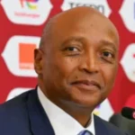 Le président de la CAF, Patrice Motsepe, en costume professionnel, représentant la direction du football africain lors de la controverse majeure sur le titre de la CAN 2026 et des réformes judiciaires.