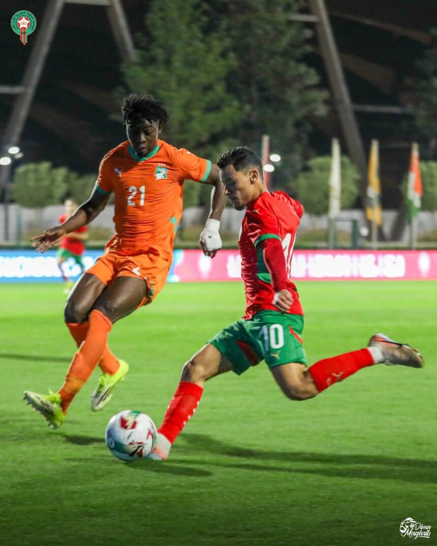 Sporting Excellence: Action de jeu de l'équipe nationale de football U-23 de Côte d'Ivoire lors de leur match nul 2-2 contre le Maroc en match amical international à Salé, le 30 mars 2026, illustrant une démonstration d'excellence sportive et de résilience.